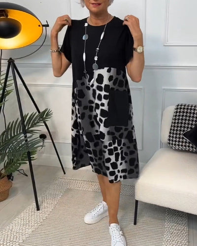 Amara | Short-sleeved, printed dress with round neckline