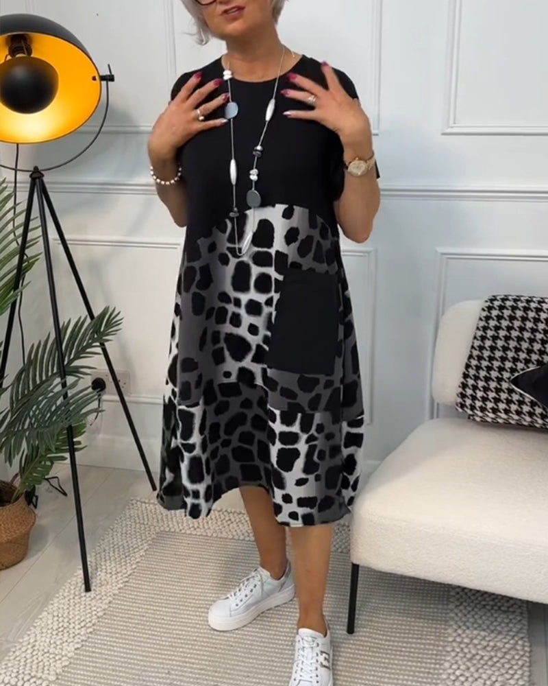 Amara | Short-sleeved, printed dress with round neckline