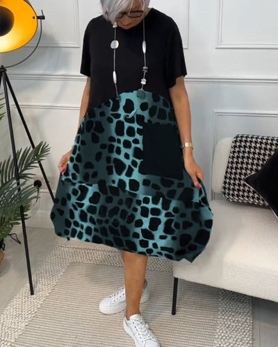 Amara | Short-sleeved, printed dress with round neckline