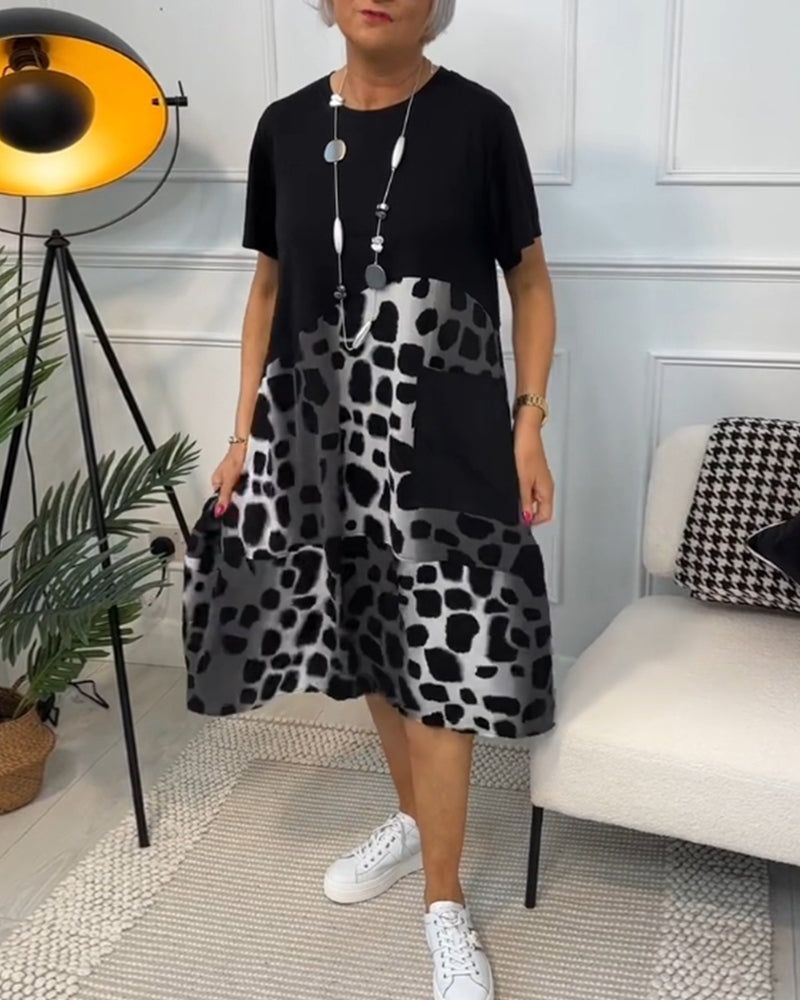 Amara | Short-sleeved, printed dress with round neckline