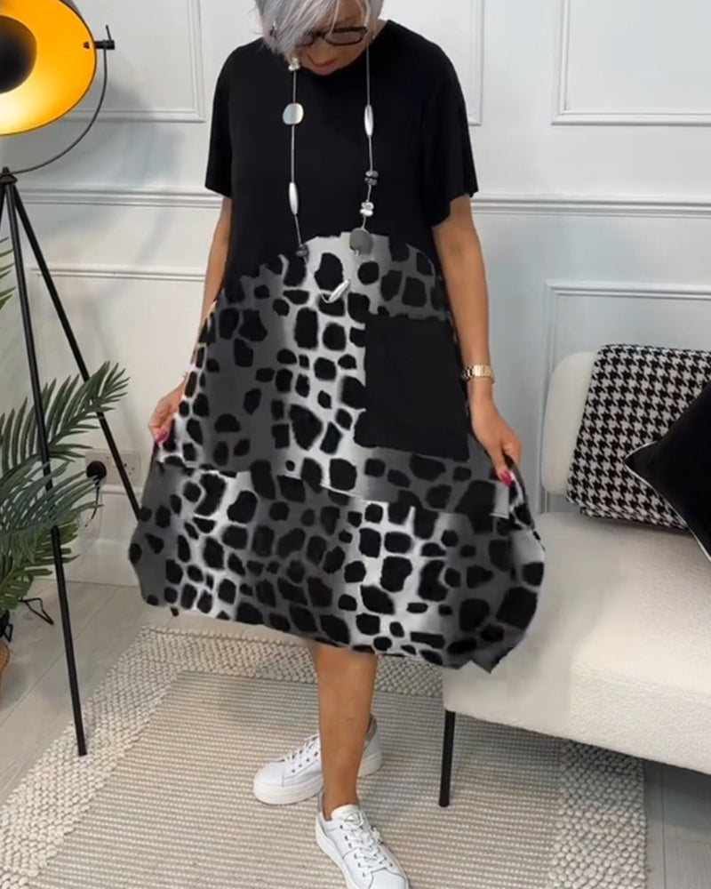 Amara | Short-sleeved, printed dress with round neckline