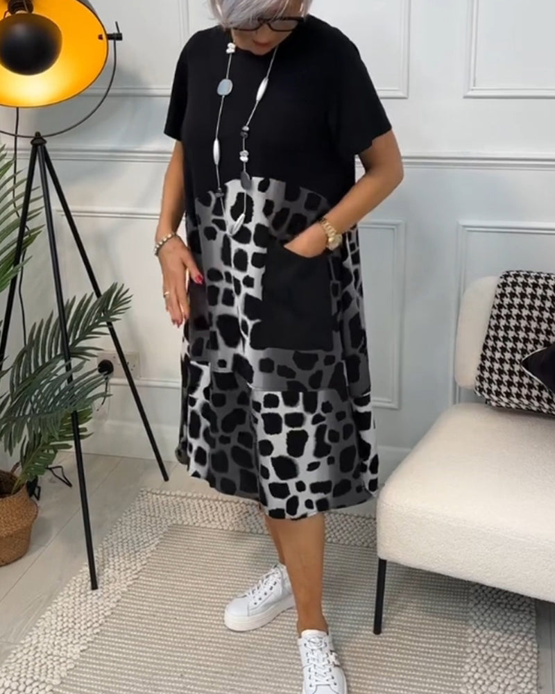 Amara | Short-sleeved, printed dress with round neckline